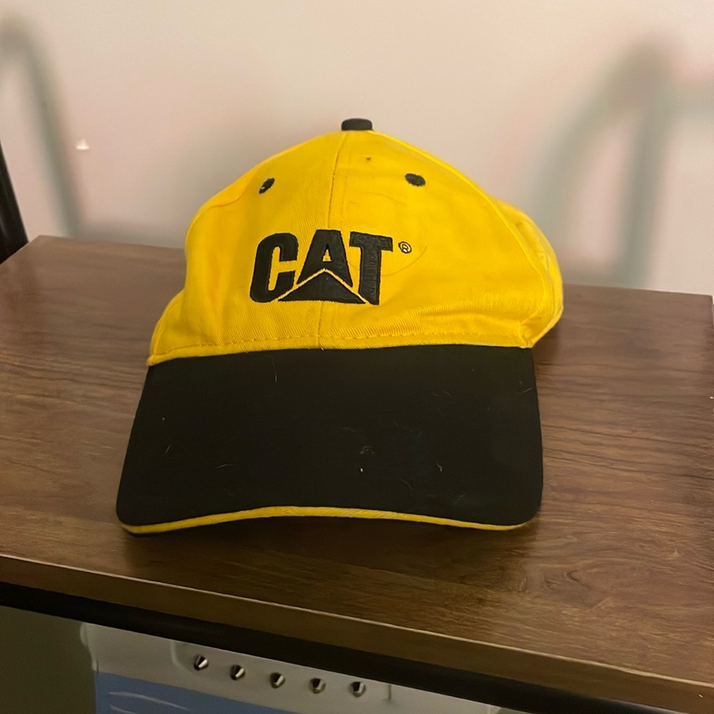 CAT baseball hat yellow and black